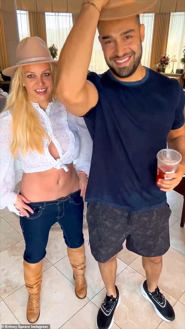 Britney Spears, 41, enlists the help of her husband Sam Asghari, 29, for latest high-energy dance clip after polarizing fans with her new song